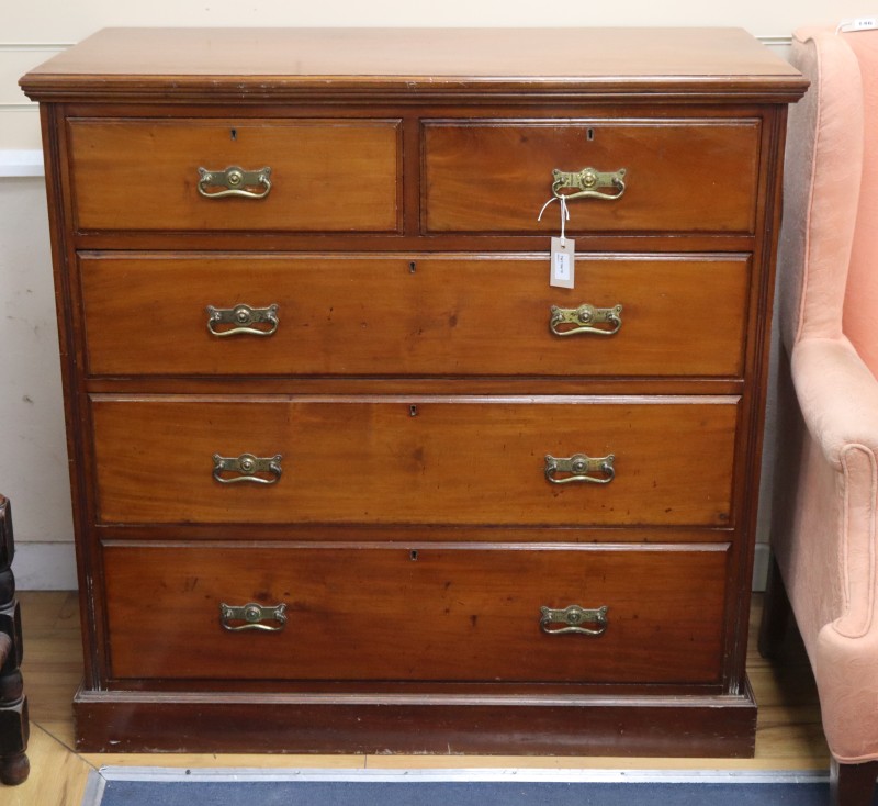 A late Victorian walnut chest of drawers, W106cm, D.52cm, H.105cm